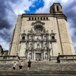 a group of people walking up and down some stairs